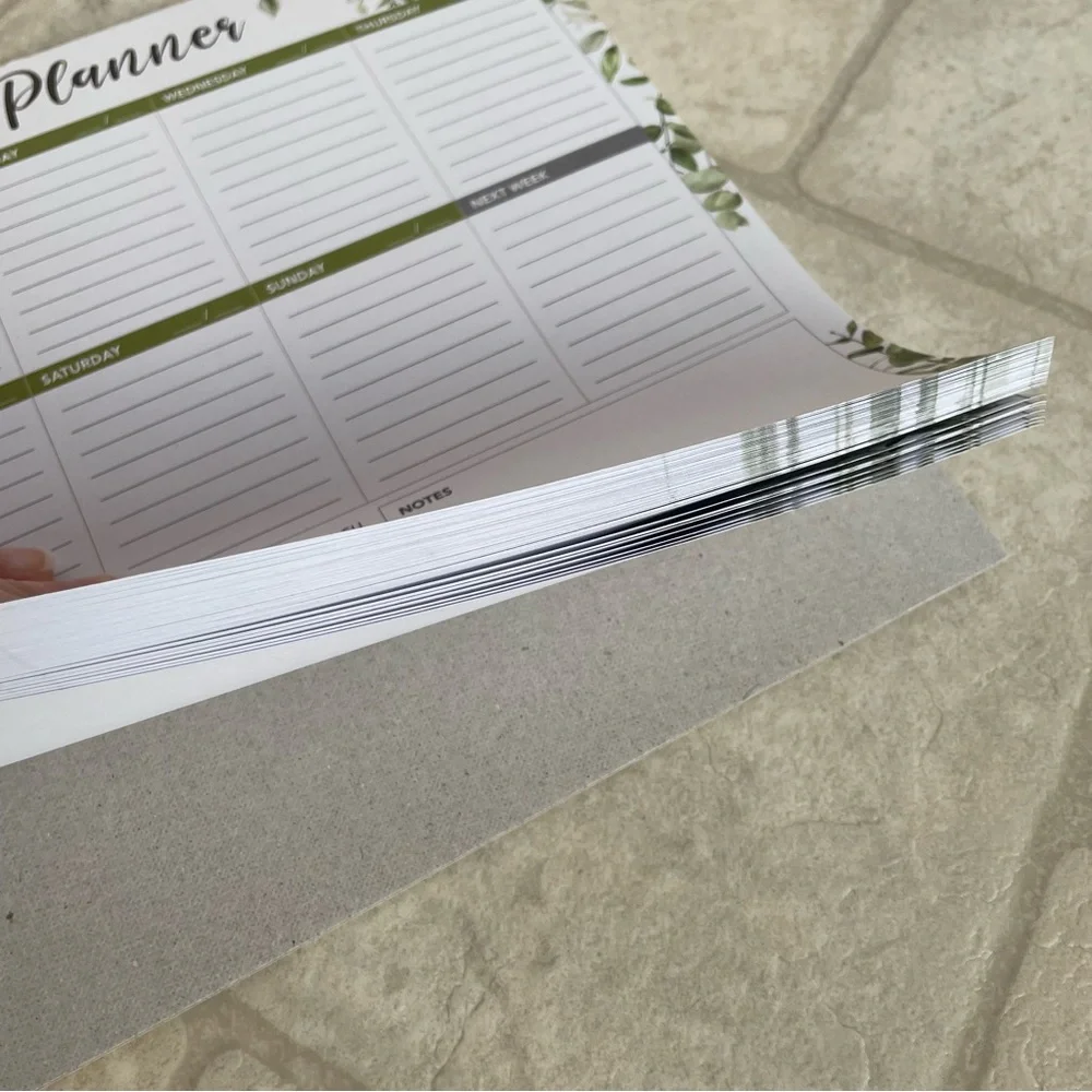 Weekly Planner with Green Leaf Design